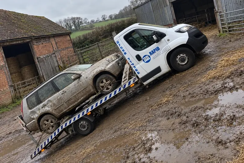 A scrap car loaded on one of our collection trucks near Kettering