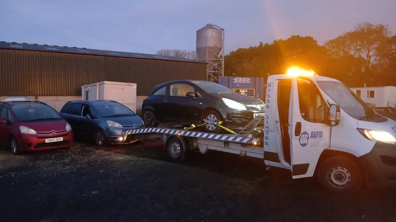 A scrap car loaded on one of our collection trucks near Lowick