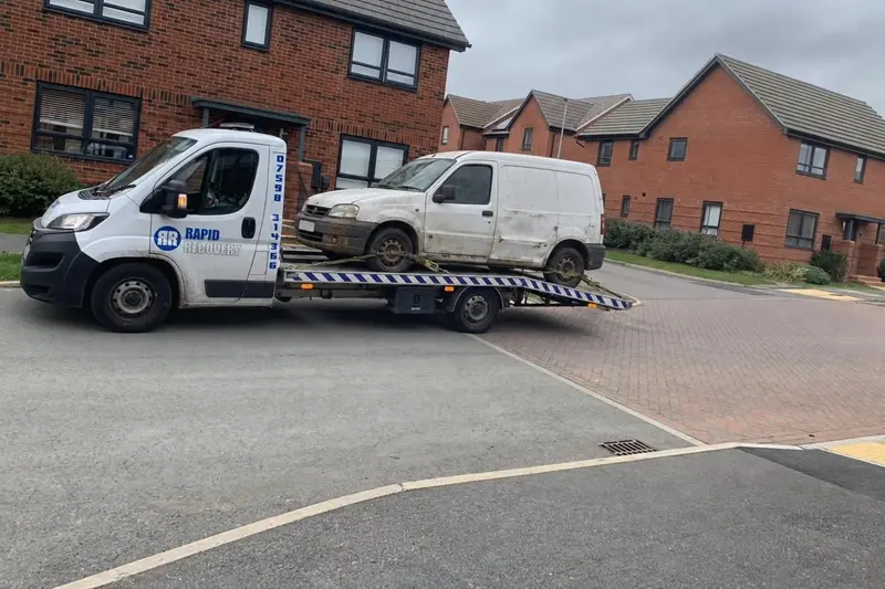 A scrap car loaded on one of our collection trucks near Rockingham